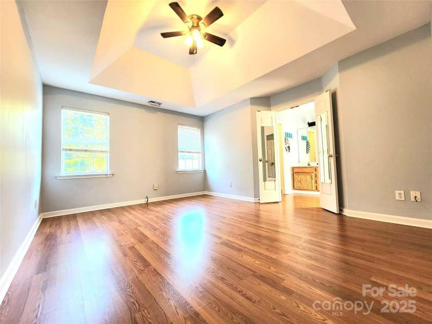 3108 Leicester Drive, Matthews, NC 28104.  MLS# CAR4273799, YatesRealty ID 33452. Spacious Main Bedroom with Tray Ceiling