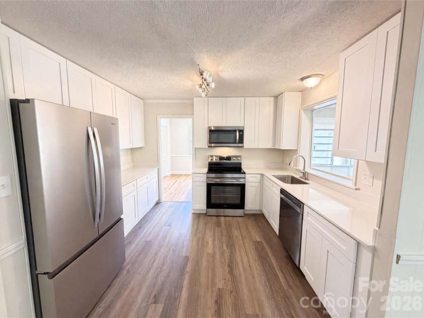 11932 Idlewild Road, Matthews, NC 28105.  MLS# CAR4397057, YatesRealty ID 33453. 