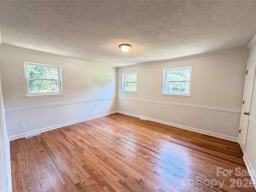 11932 Idlewild Road, Matthews, NC 28105.  MLS# CAR4397057, YatesRealty ID 33453. 