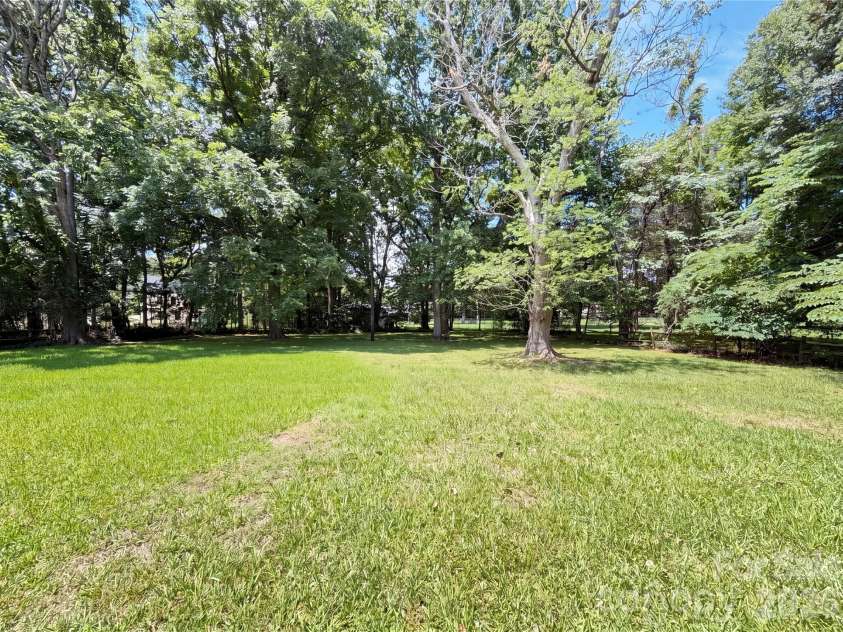 11932 Idlewild Road, Matthews, NC 28105.  MLS# CAR4397057, YatesRealty ID 33453. 