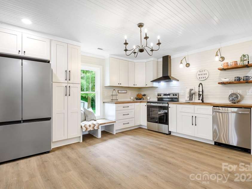 271 Fairmount Road, Statesville, NC 28625.  MLS# CAR4284489, YatesRealty ID 33455. Gorgeous kitchen with new appliances, new cabinets and butcher block countertops.