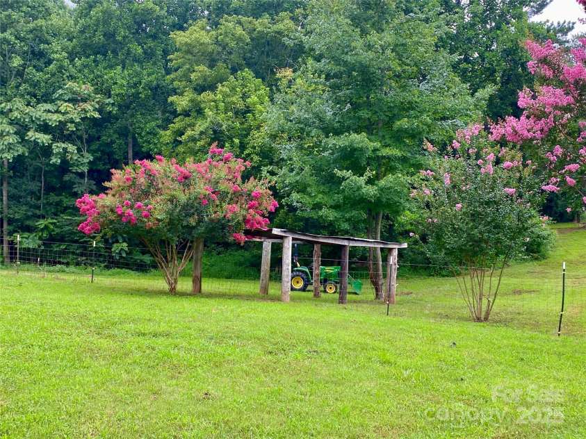 271 Fairmount Road, Statesville, NC 28625.  MLS# CAR4284489, YatesRealty ID 33455. Picture perfect setting for a mini farm lifestyle