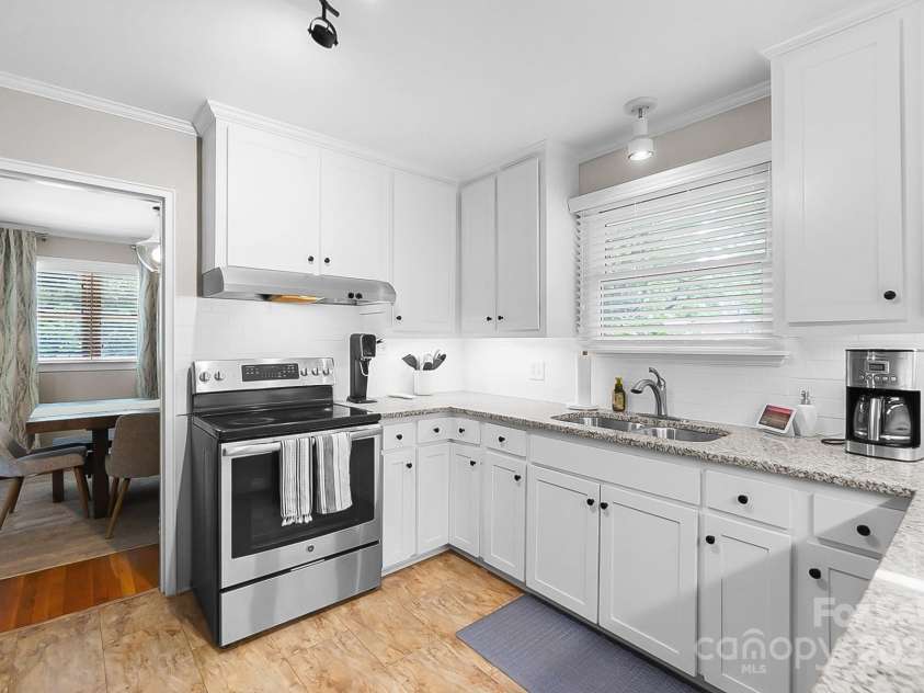 1029 Sewickley Drive, Charlotte, NC 28209.  MLS# CAR4284527, YatesRealty ID 33459. Kitchen with updated cabinets and counters