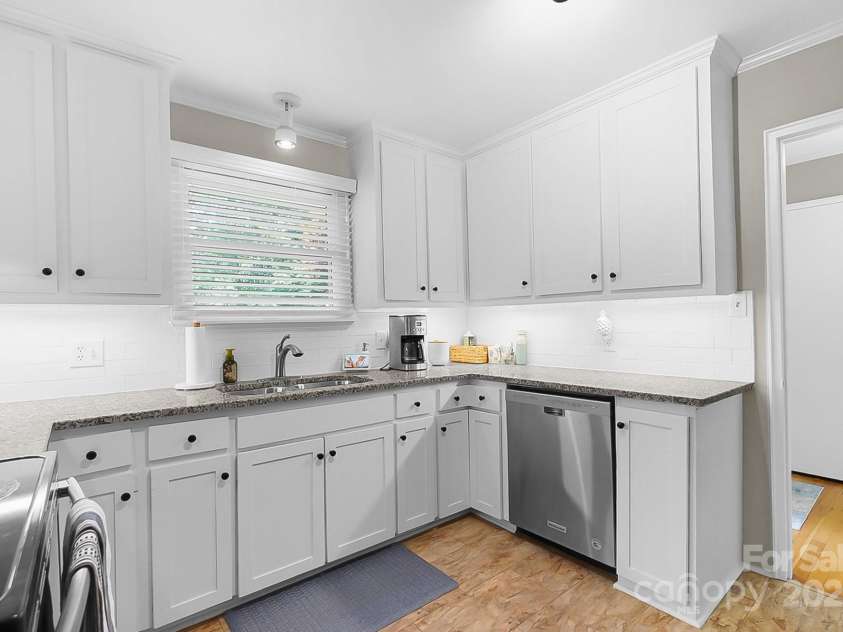 1029 Sewickley Drive, Charlotte, NC 28209.  MLS# CAR4284527, YatesRealty ID 33459. Kitchen with updated cabinets and counters
