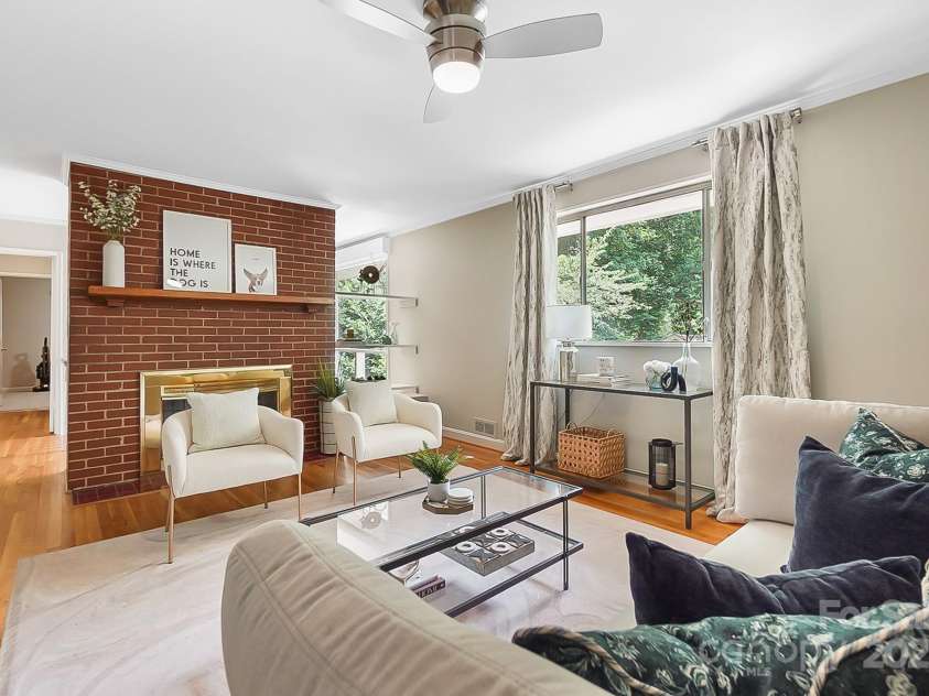 1029 Sewickley Drive, Charlotte, NC 28209.  MLS# CAR4284527, YatesRealty ID 33459. Living Room w/Wood Burning Fireplace