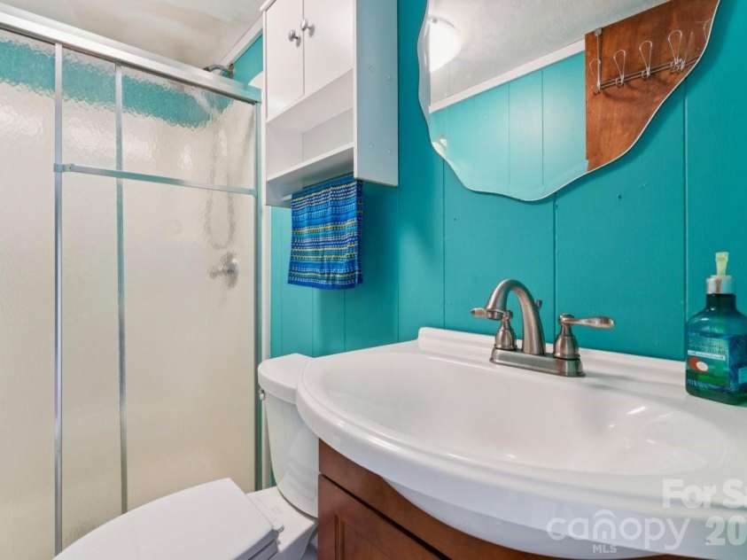 918 Pinehaven Drive, New London, NC 28127.  MLS# CAR4396889, YatesRealty ID 33459. Basement level full bath.