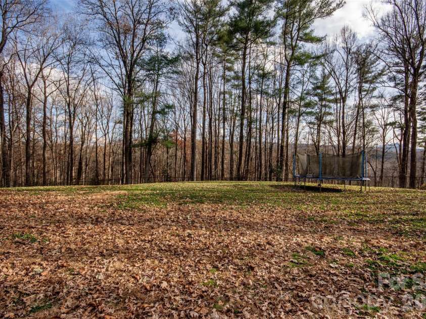 2193 Hawthorne Lane, Wilkesboro, NC 28697.  MLS# CAR4325511, YatesRealty ID 3346. Back yard