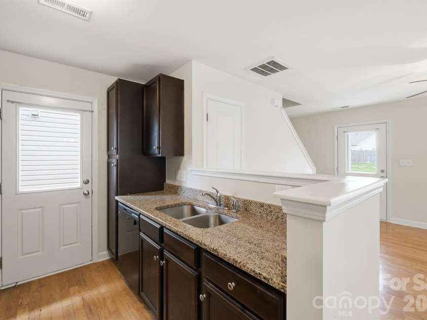 12421 Stumptown Road, Huntersville, NC 28078.  MLS# CAR4390787, YatesRealty ID 33465. Kitchen exit