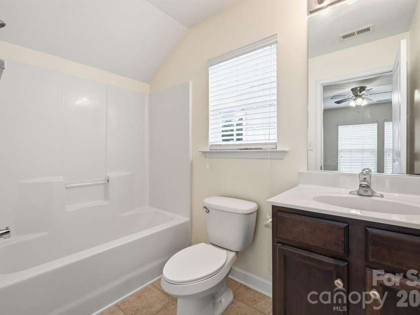 12421 Stumptown Road, Huntersville, NC 28078.  MLS# CAR4390787, YatesRealty ID 33465. Upper Bathroom