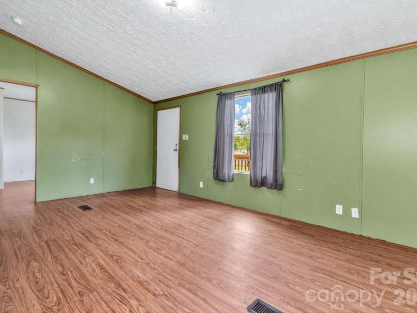 12 Green Cove Lane, Alexander, NC 28701.  MLS# CAR4397427, YatesRealty ID 33466. 