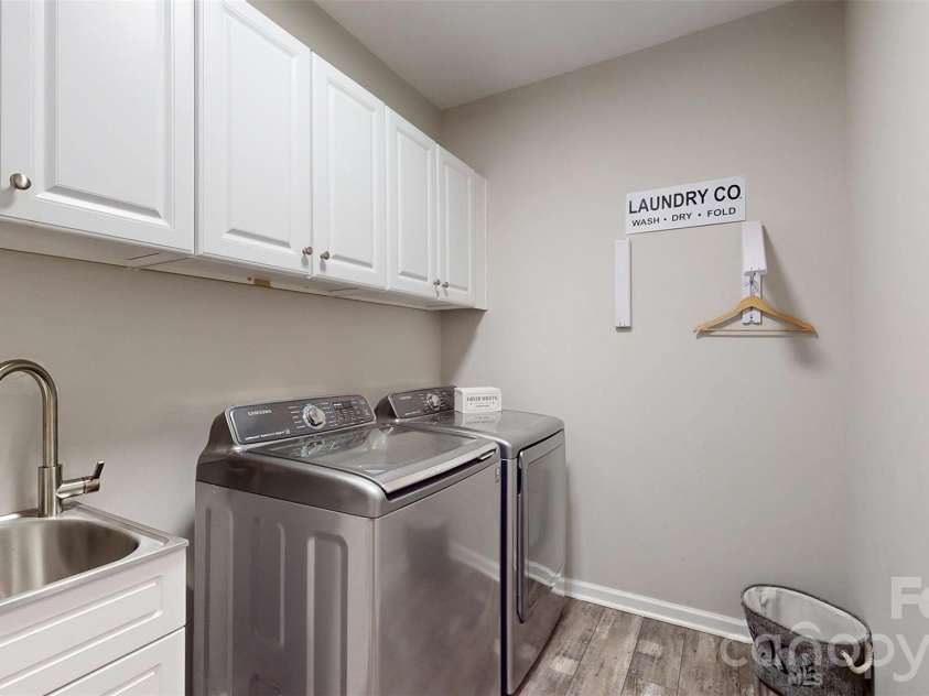 1000 Irish Moss Lane, Matthews, NC 28104.  MLS# CAR4383943, YatesRealty ID 33469. Laundry Room Main Floor