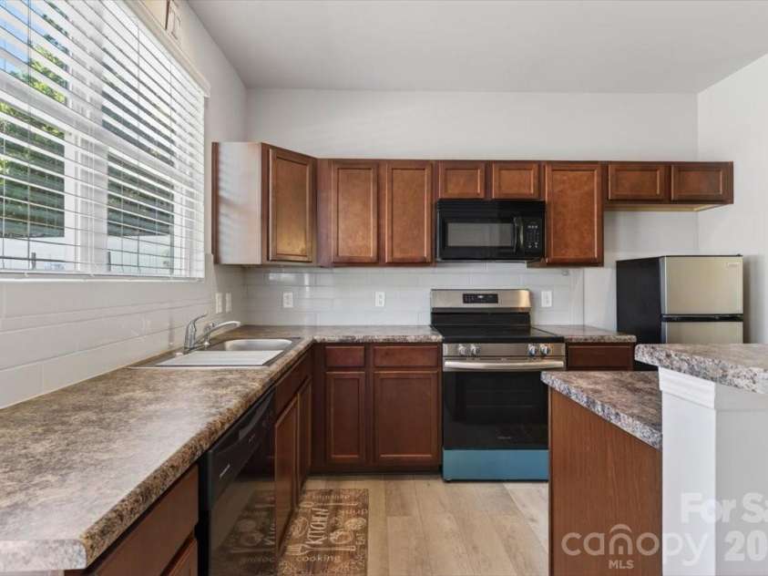 117 Island Village Drive, Mount Holly, NC 28120.  MLS# CAR4380784, YatesRealty ID 33470. 