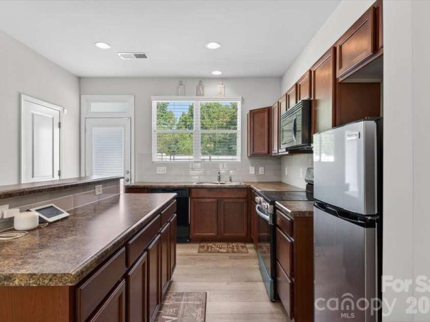 117 Island Village Drive, Mount Holly, NC 28120.  MLS# CAR4380784, YatesRealty ID 33470. 