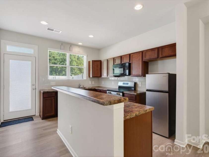117 Island Village Drive, Mount Holly, NC 28120.  MLS# CAR4380784, YatesRealty ID 33470. 