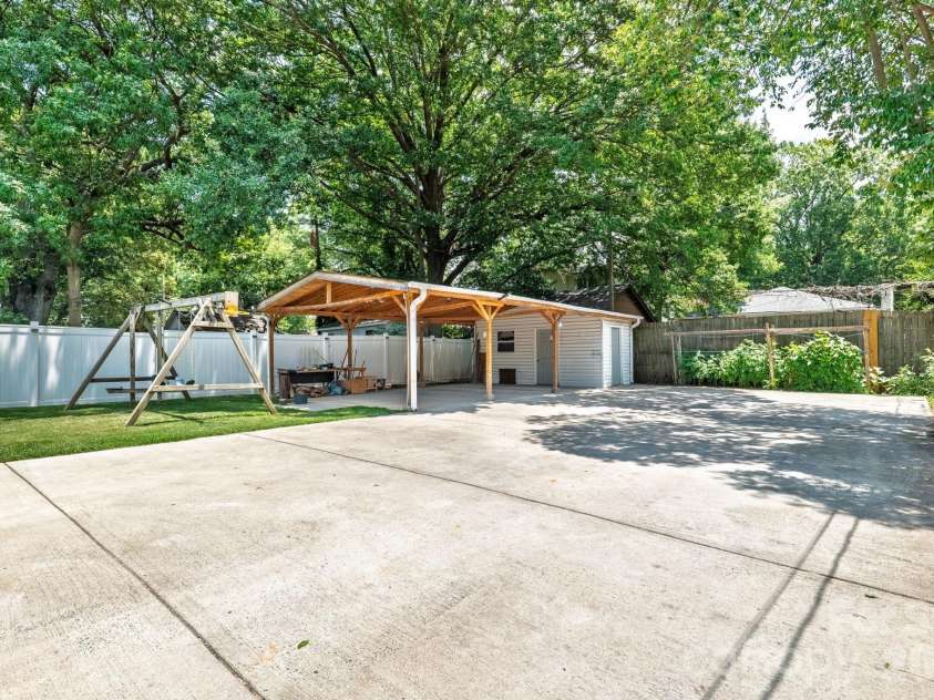 2113 Scott Avenue, Charlotte, NC 28203.  MLS# CAR4393437, YatesRealty ID 33471. Plent of parking and backyard fun