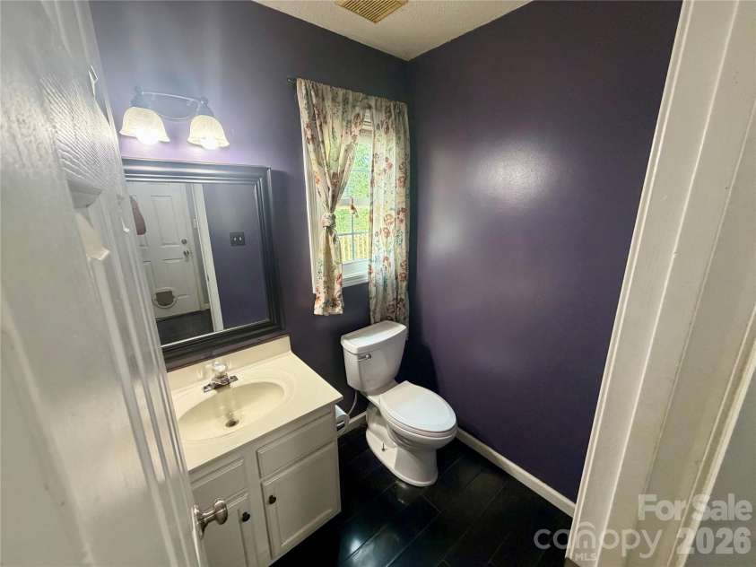 7126 Windsong Way, Wingate, NC 28174.  MLS# CAR4398067, YatesRealty ID 33474. 1/2 Bathroom Downstairs