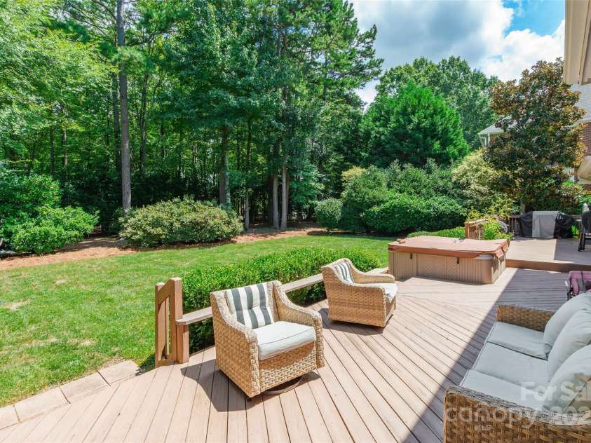 10009 Devonshire Drive, Huntersville, NC 28078.  MLS# CAR4292222, YatesRealty ID 33475. Hot tub on the back deck