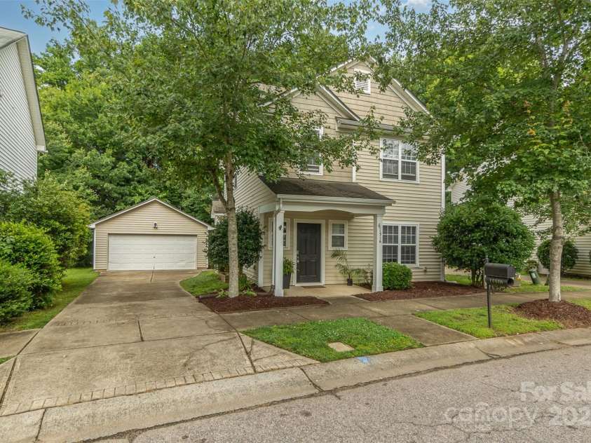 11516 Heritage Green Drive, Cornelius, NC 28031.  MLS# CAR4289684, YatesRealty ID 33480. Large Driveway extends to a 2 car detached garage