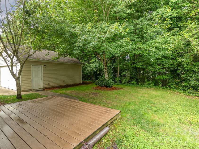 11516 Heritage Green Drive, Cornelius, NC 28031.  MLS# CAR4289684, YatesRealty ID 33480. Large Yard backs on to treed space