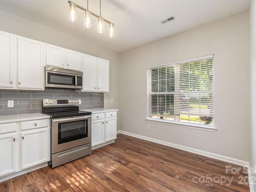 11516 Heritage Green Drive, Cornelius, NC 28031.  MLS# CAR4289684, YatesRealty ID 33480. Stainless Steel Appliances and built-in microwave