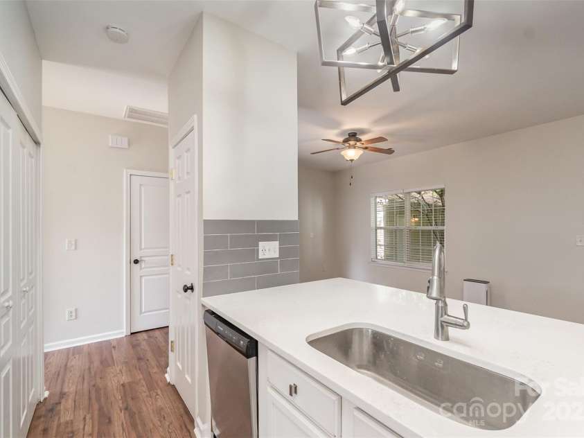 11516 Heritage Green Drive, Cornelius, NC 28031.  MLS# CAR4289684, YatesRealty ID 33480. Updated black splash and lighting