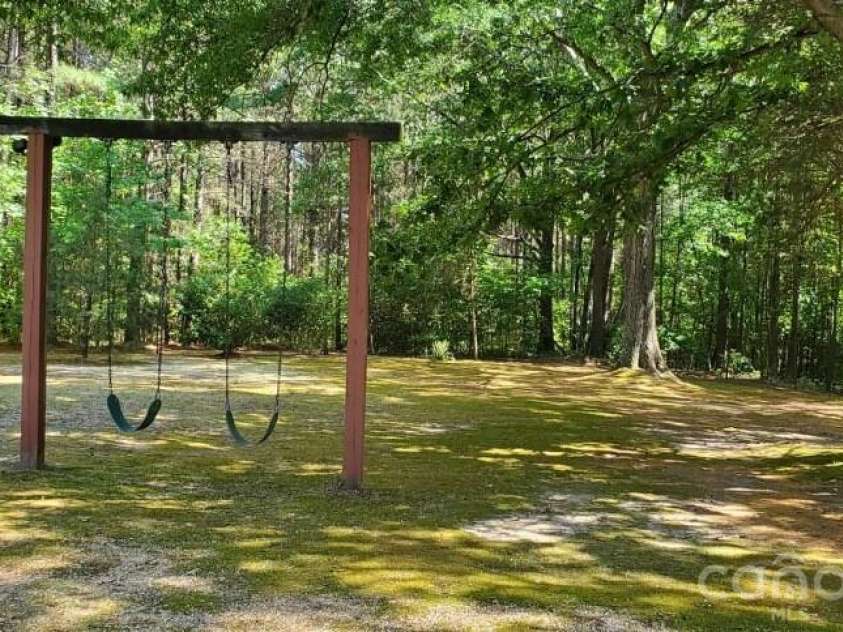 205 Aquila Lane, Rockwell, NC 28138.  MLS# CAR4394494, YatesRealty ID 33484. Backyard swing