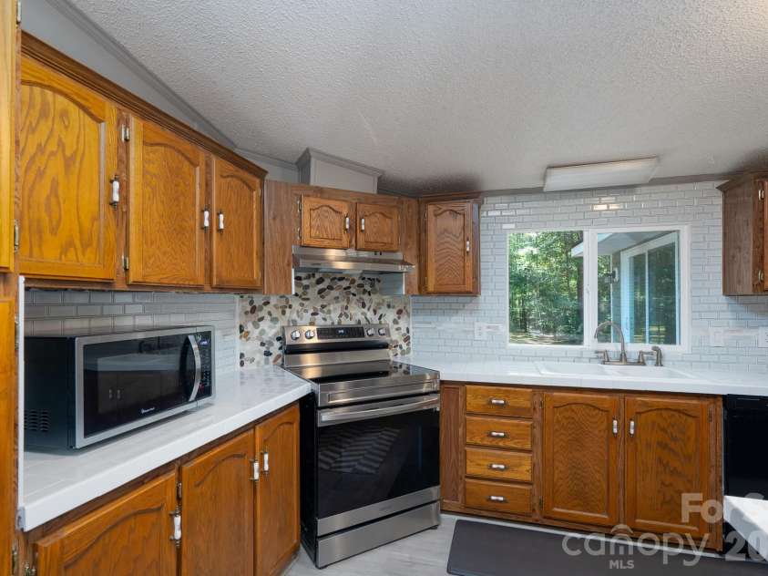 205 Aquila Lane, Rockwell, NC 28138.  MLS# CAR4394494, YatesRealty ID 33484. Kitchen