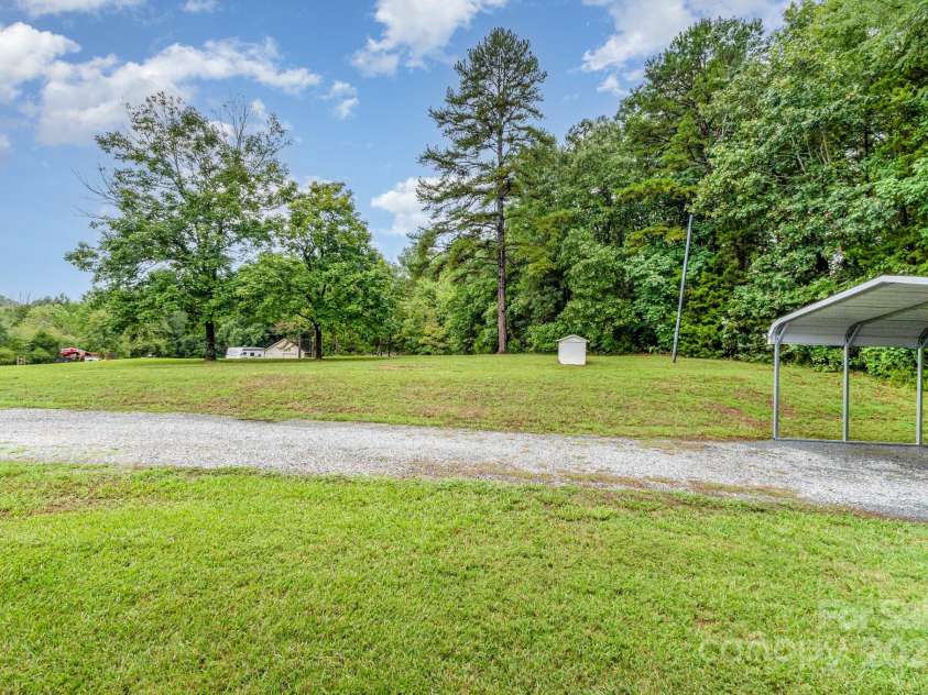 4206 Flowes Store Road, Concord, NC 28025.  MLS# CAR4291656, YatesRealty ID 33486. More back yard views