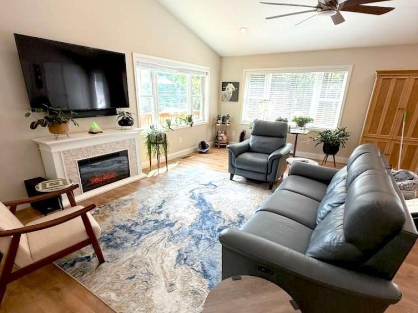 118 Rolling Lane, Maggie Valley, NC 28751.  MLS# CAR4303888, YatesRealty ID 33489. Cozy seating around the fireplace