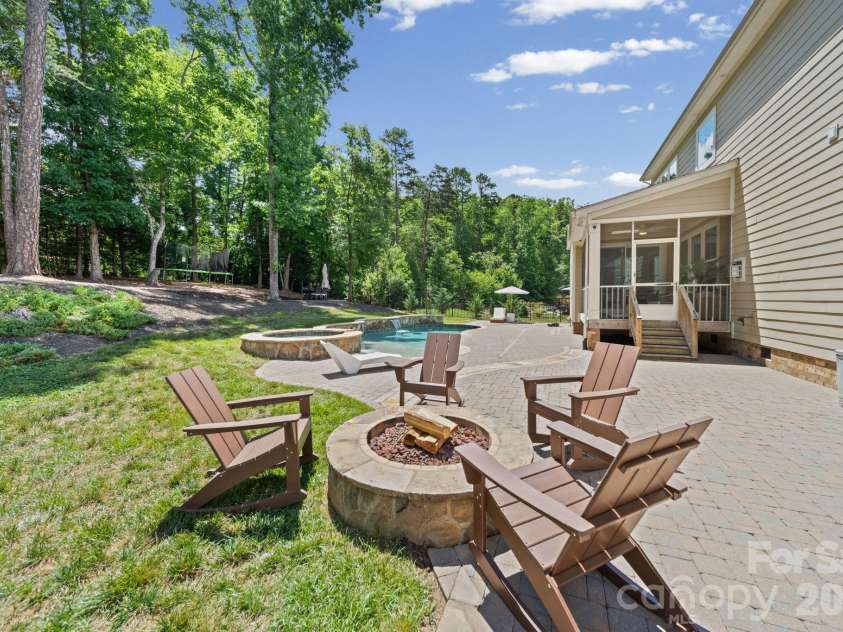 163 Monteray Oaks Circle, Fort Mill, SC 29715.  MLS# CAR4386895, YatesRealty ID 33489. Firepit