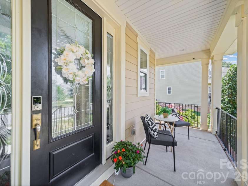 163 Monteray Oaks Circle, Fort Mill, SC 29715.  MLS# CAR4386895, YatesRealty ID 33489. Wraparound Front Porch