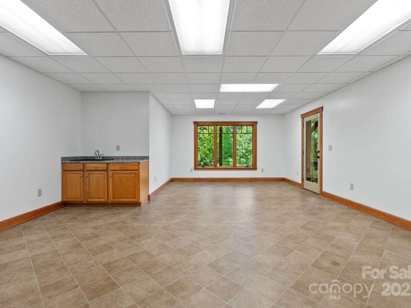 147 Brantley Branch Lane, Waynesville, NC 28786.  MLS# CAR4275100, YatesRealty ID 3349. Bonus room is perfect for the hobby enthusiast