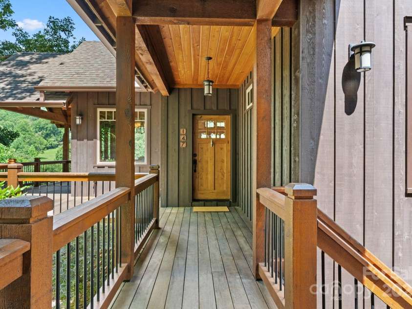 147 Brantley Branch Lane, Waynesville, NC 28786.  MLS# CAR4275100, YatesRealty ID 3349. Covered walkway to enter the front door