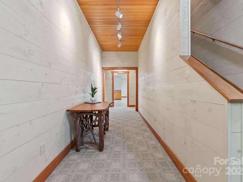 147 Brantley Branch Lane, Waynesville, NC 28786.  MLS# CAR4275100, YatesRealty ID 3349. Entry to the lower level 