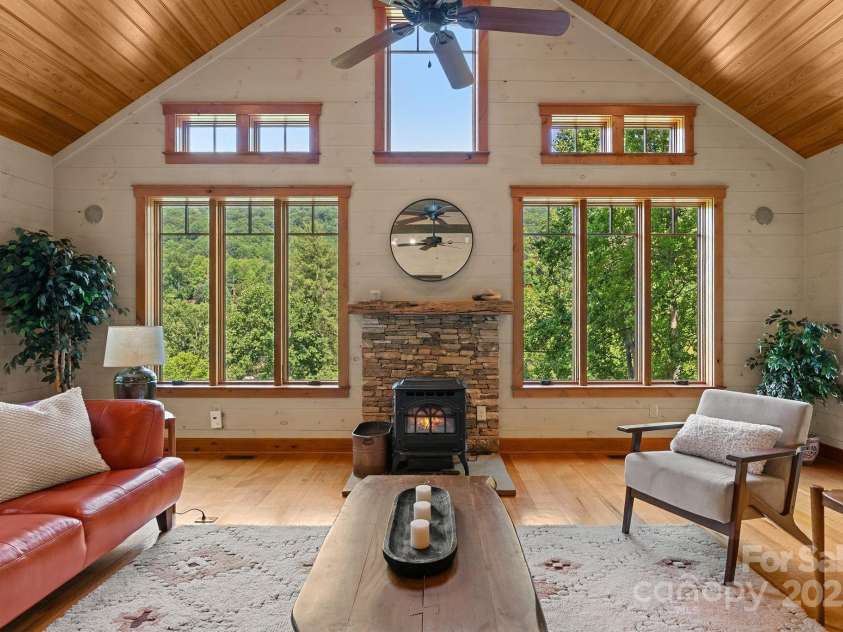 147 Brantley Branch Lane, Waynesville, NC 28786.  MLS# CAR4275100, YatesRealty ID 3349. Large windows let in the light