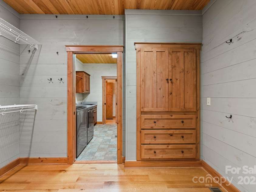 147 Brantley Branch Lane, Waynesville, NC 28786.  MLS# CAR4275100, YatesRealty ID 3349. Leads to main level laundry room