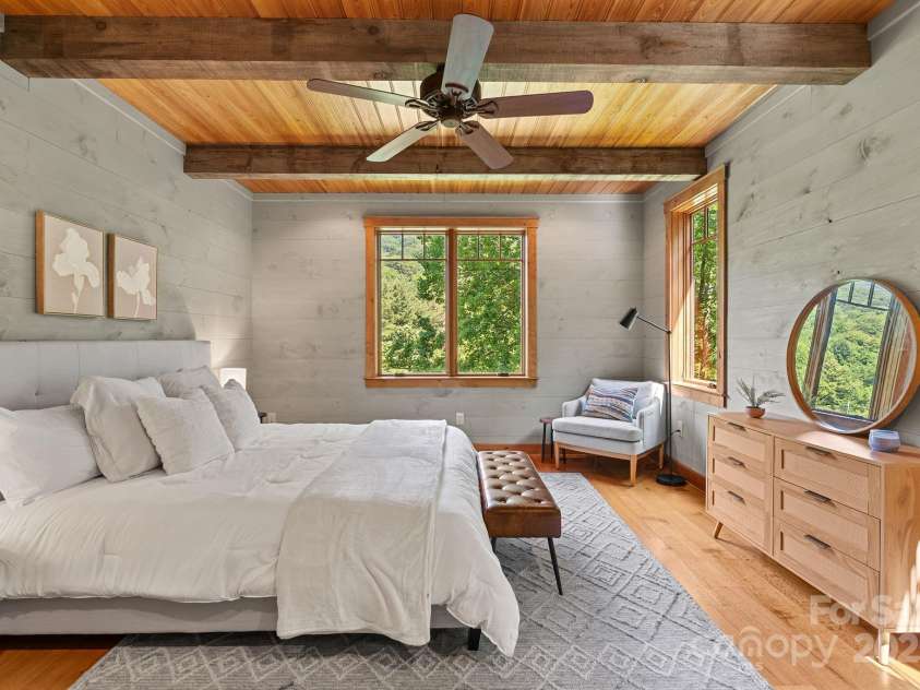 147 Brantley Branch Lane, Waynesville, NC 28786.  MLS# CAR4275100, YatesRealty ID 3349. Main level primary suite