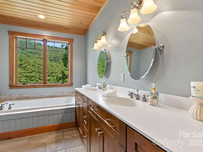 147 Brantley Branch Lane, Waynesville, NC 28786.  MLS# CAR4275100, YatesRealty ID 3349. Primary bathroom