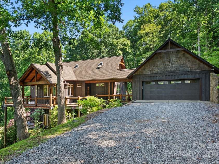 147 Brantley Branch Lane, Waynesville, NC 28786.  MLS# CAR4275100, YatesRealty ID 3349. Two car drive-thru garage