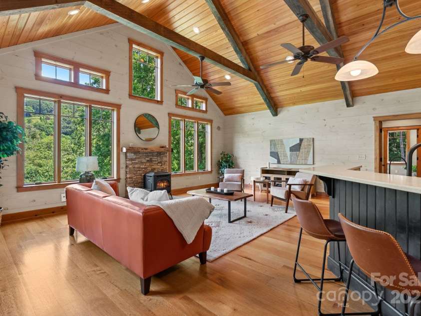 147 Brantley Branch Lane, Waynesville, NC 28786.  MLS# CAR4275100, YatesRealty ID 3349. Vaulted ceilings with wood beam details