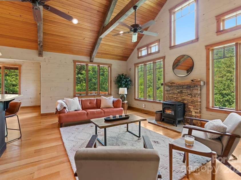 147 Brantley Branch Lane, Waynesville, NC 28786.  MLS# CAR4275100, YatesRealty ID 3349. Weathered pine timbers on living room ceiling