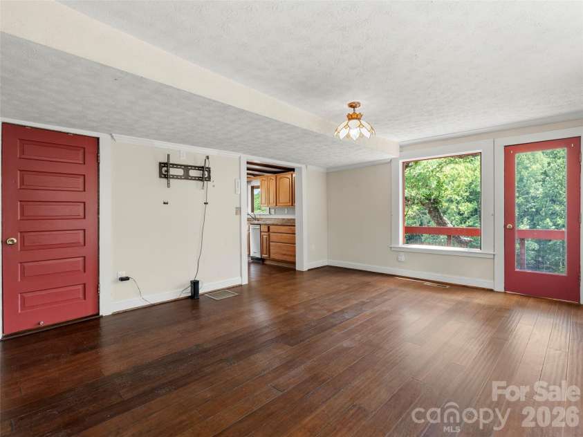54 Louisiana Avenue, Saluda, NC 28773.  MLS# CAR4396216, YatesRealty ID 33490. 