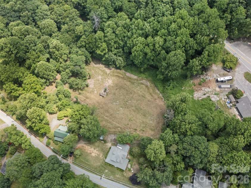 54 Louisiana Avenue, Saluda, NC 28773.  MLS# CAR4396216, YatesRealty ID 33490. 