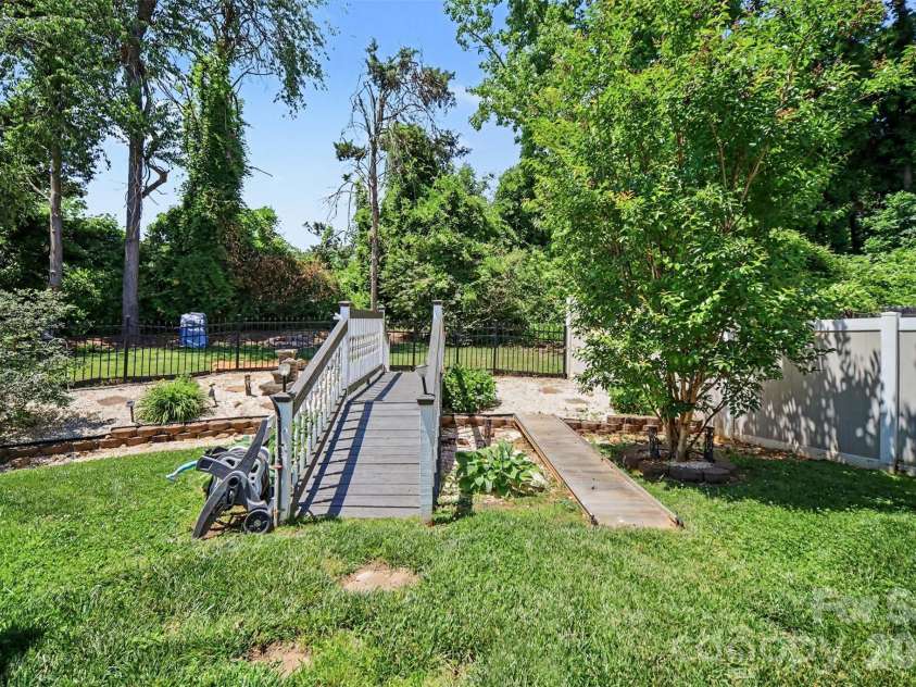 112 Elysian Estate Court, Mooresville, NC 28115.  MLS# CAR4384079, YatesRealty ID 33491. Backyard