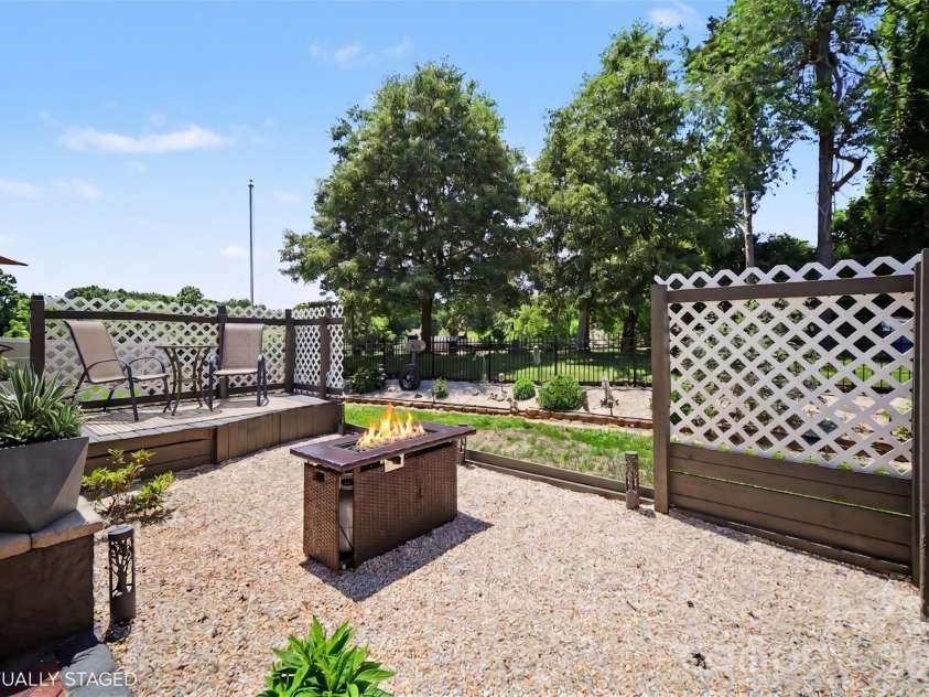 112 Elysian Estate Court, Mooresville, NC 28115.  MLS# CAR4384079, YatesRealty ID 33491. Virtually Staged Backyard