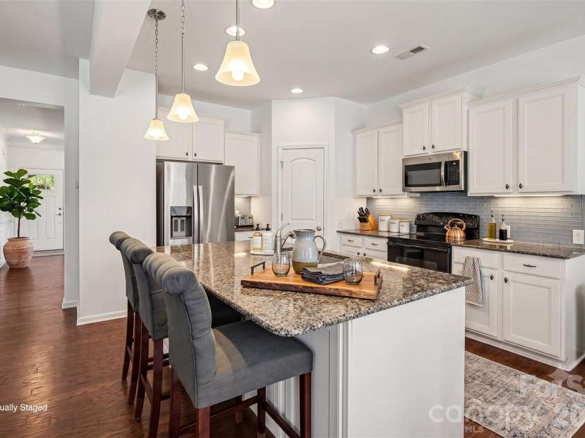 112 Elysian Estate Court, Mooresville, NC 28115.  MLS# CAR4384079, YatesRealty ID 33491. Virtually Staged Kitchen