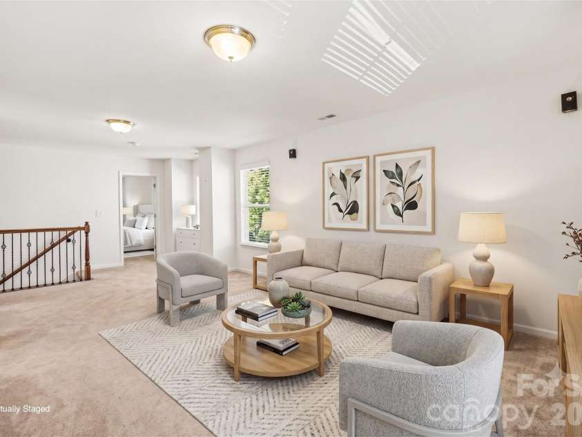 112 Elysian Estate Court, Mooresville, NC 28115.  MLS# CAR4384079, YatesRealty ID 33491. Virtually Staged Loft