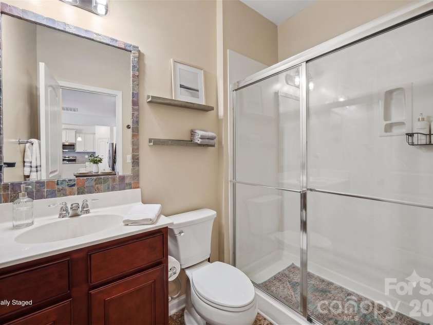 112 Elysian Estate Court, Mooresville, NC 28115.  MLS# CAR4384079, YatesRealty ID 33491. Virtually Staged Main Level Bathroom