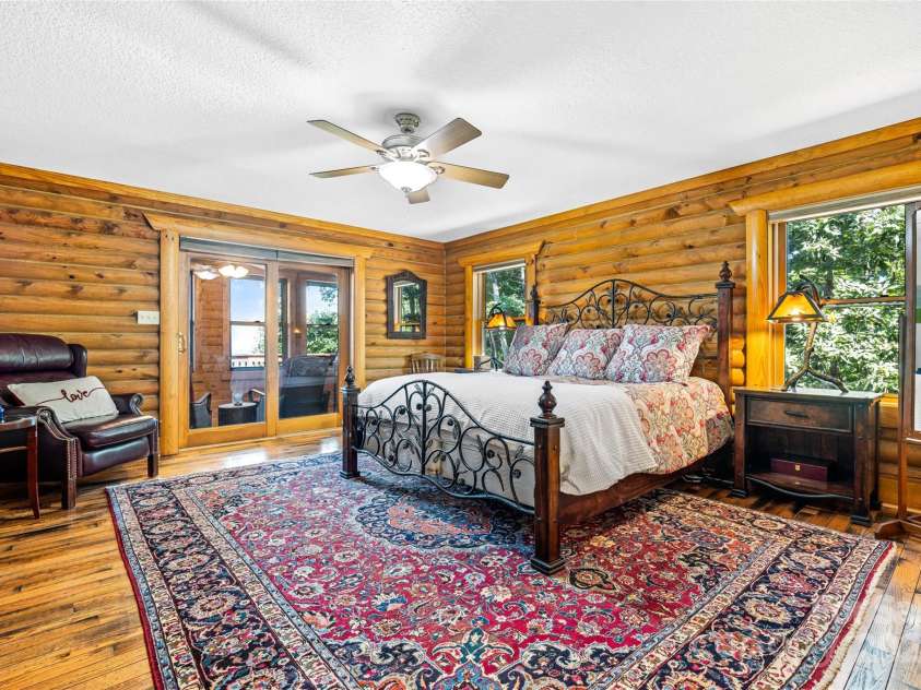 82 Running Ridge Road, Asheville, NC 28804.  MLS# CAR4294113, YatesRealty ID 33495. Primary Suite with private screened porch