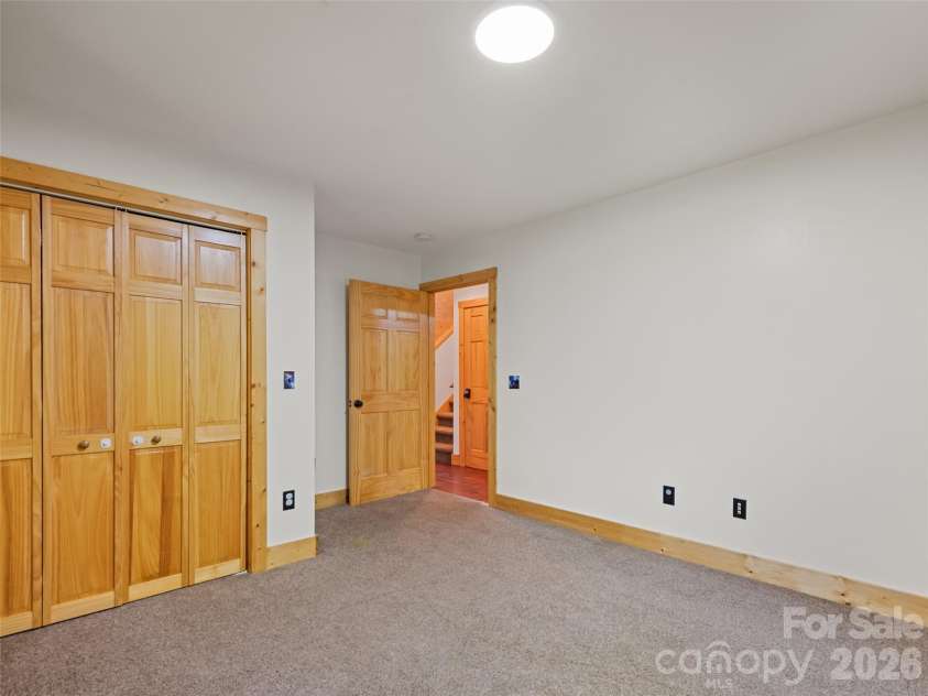 51 Stony Pond Lane, Canton, NC 28716.  MLS# CAR4380850, YatesRealty ID 33499. Second bedroom on main floor, view#2